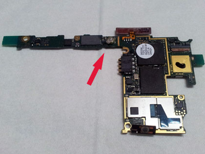 The SGS2 mainboard with the arrow showing the leaky battery BAT500